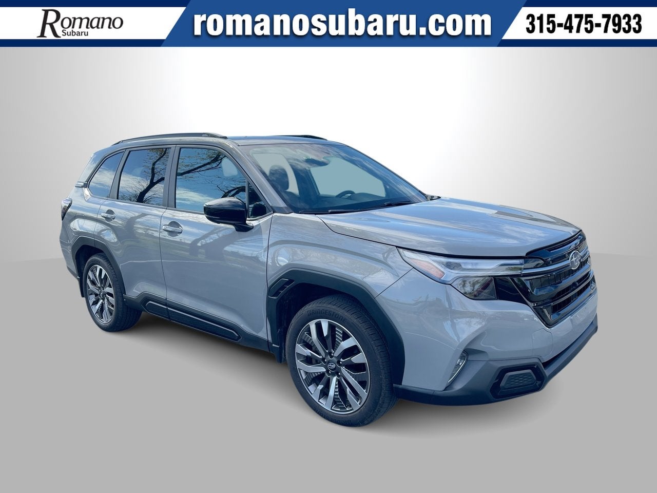 2026 Subaru Forester Touring in River Rock Pearl — front three-quarter view
