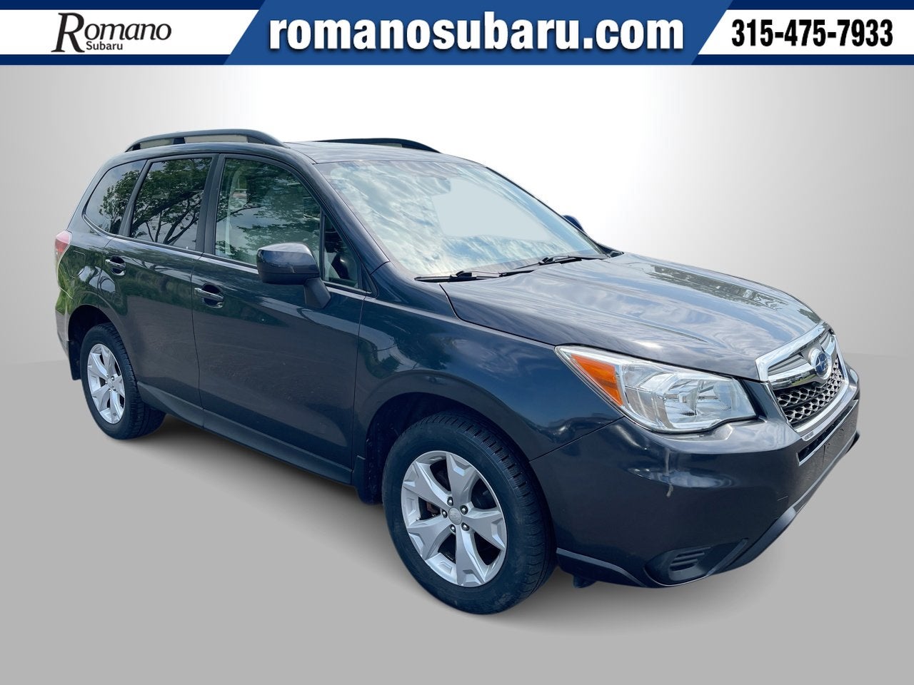 2016 Subaru Forester 2.5i Premium in Dark Gray Metallic — front three-quarter view