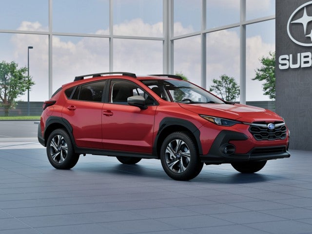 2026 Subaru CROSSTREK Premium in Lithium Red Pearl — front three-quarter view