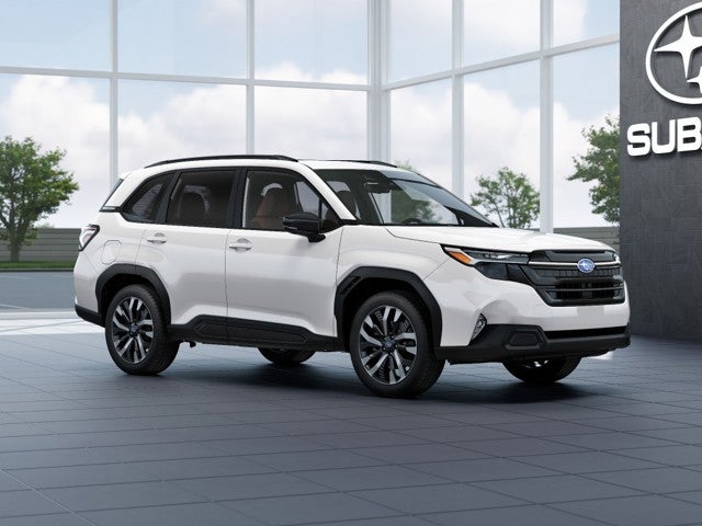 2026 Subaru FORESTER Touring in Crystal White Pearl — front three-quarter view