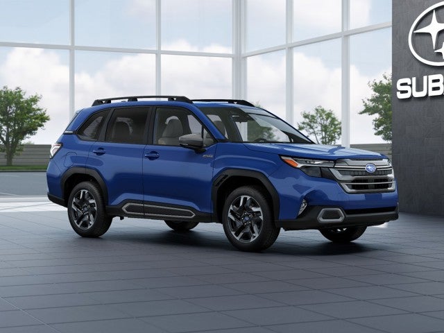 2026 Subaru FORESTER Limited Hybrid in Daybreak Blue Pearl — front three-quarter view