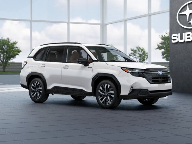 2026 Subaru FORESTER Touring Hybrid in Crystal White Pearl — front three-quarter view