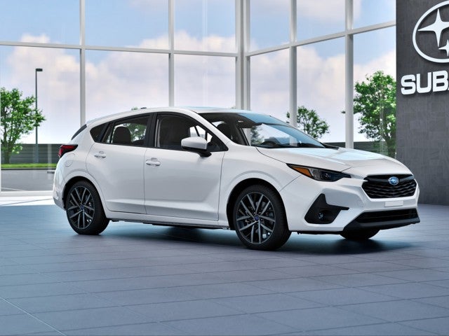 2026 Subaru IMPREZA Sport in Crystal White Pearl — front three-quarter view