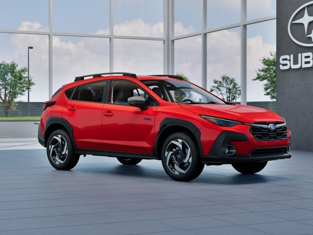 2026 Subaru CROSSTREK Limited Hybrid in Pure Red — front three-quarter view